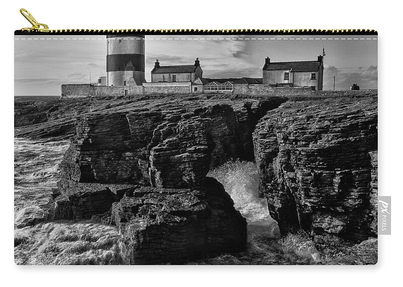 Hook Carry-all Pouch featuring the photograph Stormy day at Hook Head Lighthouse by Nigel R Bell