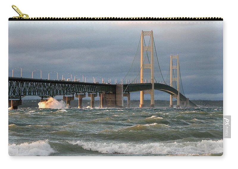Storm Zip Pouch featuring the photograph Stormy Straits of Mackinac by Keith Stokes