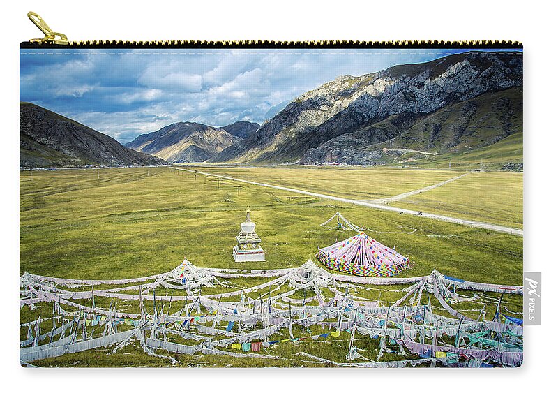 Chinese Culture Zip Pouch featuring the photograph Stupa And Prayer Flags In Batang Valley by Yves Andre