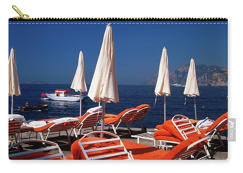 Shadow Zip Pouch featuring the photograph Sun Beds, Umbrellas At Private Beach Of by Dallas Stribley
