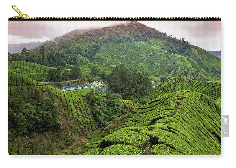 Cameron Highlands Zip Pouch featuring the photograph Sungai Palas Tea Estate With Workers by Anders Blomqvist