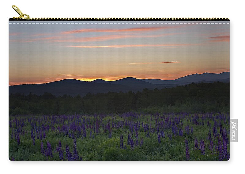 Sunrise Zip Pouch featuring the photograph Sunrise over a Field of Lupines by John Vose