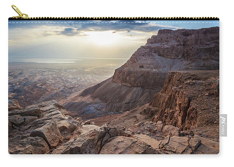 Dawn Zip Pouch featuring the photograph Sunrise Over Masada by Reynold Mainse / Design Pics