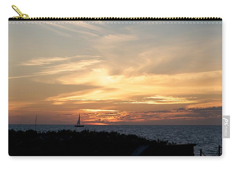 Sunset And Sailboat Zip Pouch featuring the photograph Sunset at the Beach by Kristin Hatt