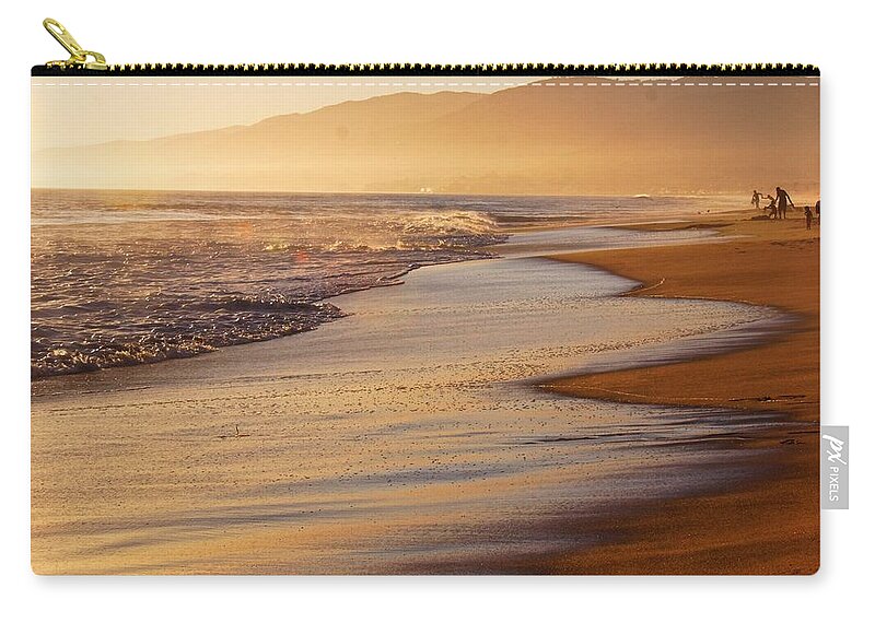 Beach Zip Pouch featuring the photograph Sunset on a Beach by Alexander Fedin
