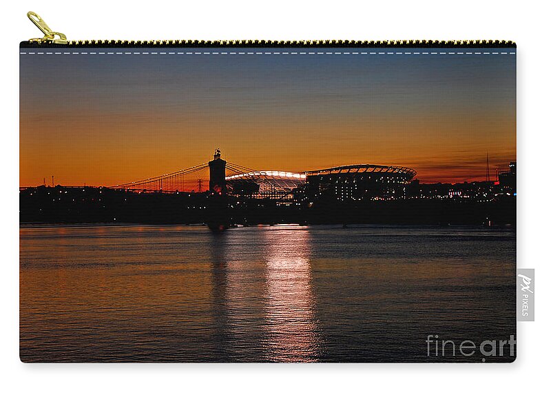 Cincinnati Zip Pouch featuring the photograph Sunset on Paul Brown Stadium by Mary Carol Story