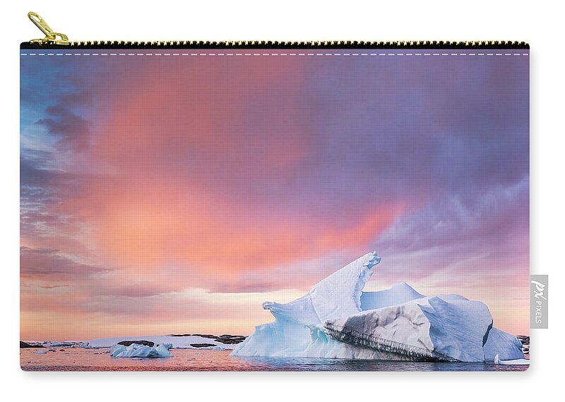 Tranquility Zip Pouch featuring the photograph Sunset Sky Over Floating Iceberg by Patrick J Endres - Alaskaphotographics