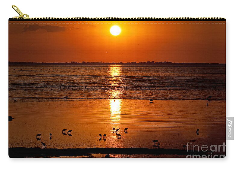 Sunset Zip Pouch featuring the photograph Sunset with the Birds Photo by Meg Rousher