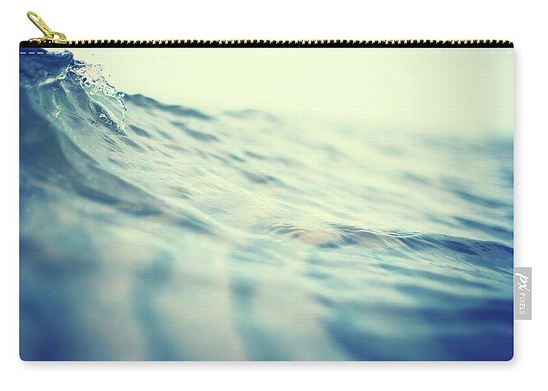 Swimming Pool Zip Pouch featuring the photograph Surface Of Water With Slight Wave by Danilovi
