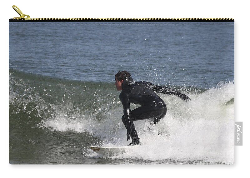 Surfer Hitting The Curl Zip Pouch featuring the photograph Surfer Hitting the Curl by John Telfer