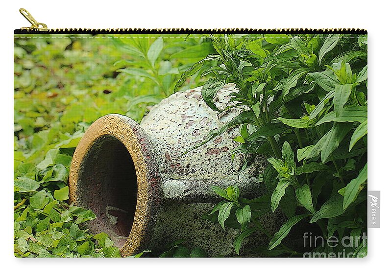 Nature Carry-all Pouch featuring the photograph Terracotta vase in the green by Amanda Mohler