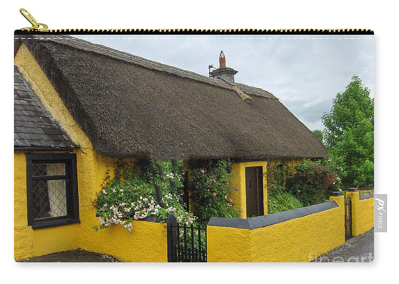 Ireland Zip Pouch featuring the photograph Thatched House Ireland by Brenda Brown