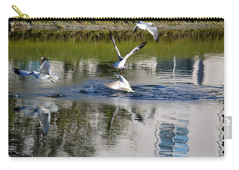 Florida Zip Pouch featuring the photograph the Breakup by Linda Kerkau