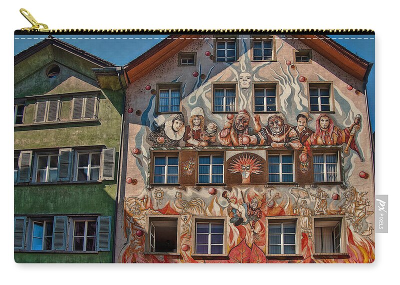Switzerland Zip Pouch featuring the photograph The Carnival House by Hanny Heim