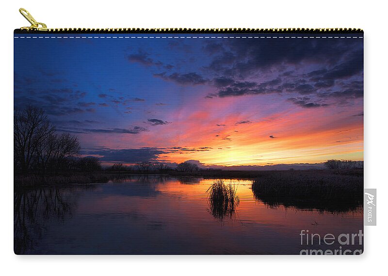 Rocky Mountain Arsenal Sunset Zip Pouch featuring the photograph The Cool of the Evening by Jim Garrison