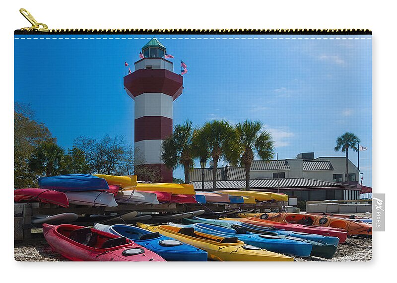 Lighthouse Zip Pouch featuring the photograph The famous lighthouse at Harbourtown on Hilton Head Island by Louise Heusinkveld