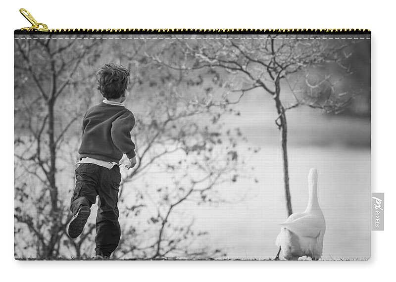 Goose Chase Zip Pouch featuring the photograph The Goose Chase by Priya Ghose