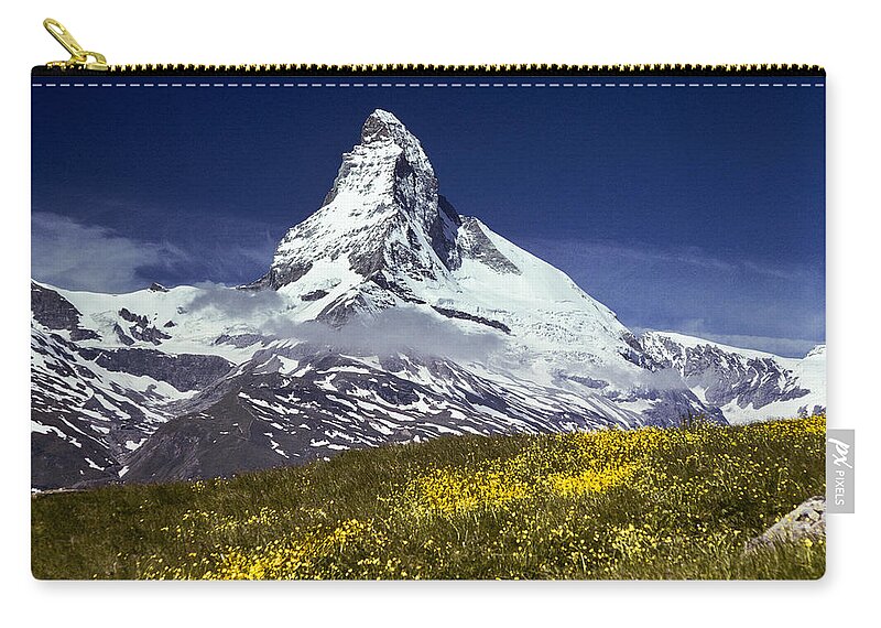 Alpine Carry-all Pouch featuring the photograph The Matterhorn with Alpine Meadow in Foreground by Jeff Goulden