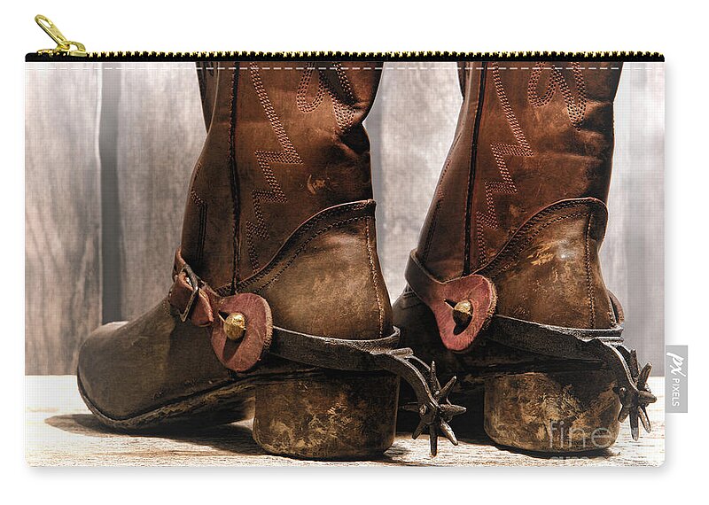 Cowboy Zip Pouch featuring the photograph The Muddy Boots by Olivier Le Queinec