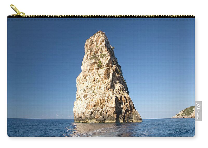 Tranquility Zip Pouch featuring the photograph The Ortholithos Rock, Paxos, Greece by David C Tomlinson