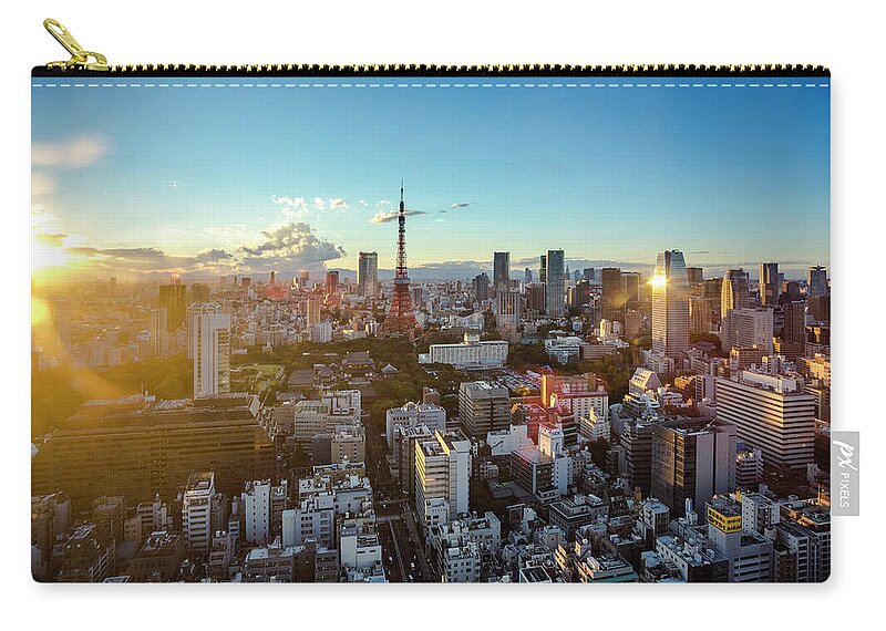 Tokyo Tower Zip Pouch featuring the photograph Tokyo Tower After Raining by Panithan Fakseemuang