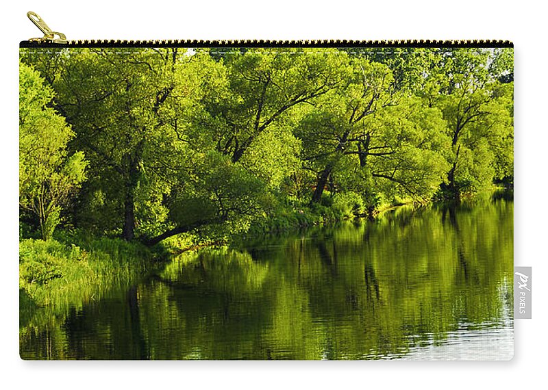 Trees Zip Pouch featuring the photograph Trees reflecting in river by Elena Elisseeva