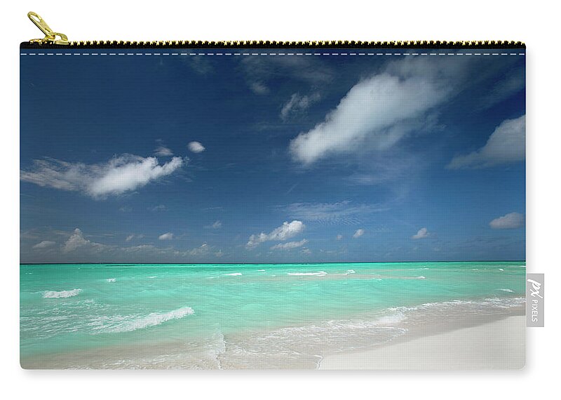 Water's Edge Zip Pouch featuring the photograph Tropical Beach Maldives by Sakis Papadopoulos