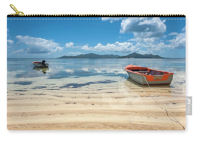 Water's Edge Zip Pouch featuring the photograph Tropical Island Lagoon Boats Moored On by Fotovoyager