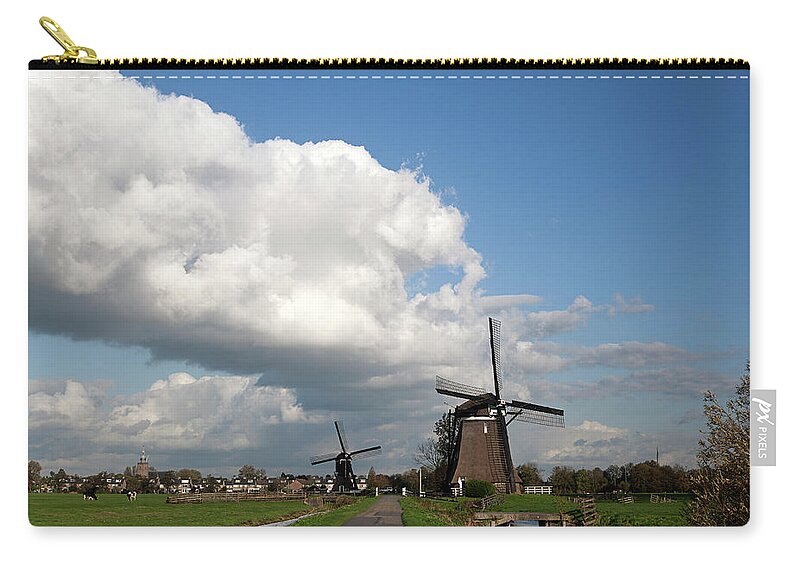 Scenics Zip Pouch featuring the photograph Two Windmills In Dutch Polder by Roel Meijer