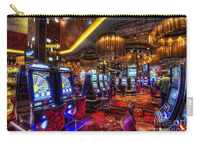 Art Zip Pouch featuring the photograph Vegas Slot Machines by Yhun Suarez