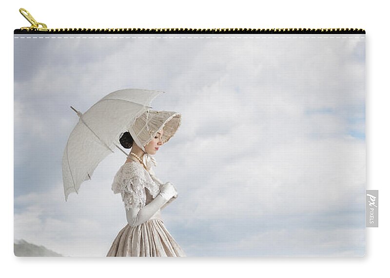 Victorian Zip Pouch featuring the photograph Victorian Woman On A Shingle Beach by Lee Avison