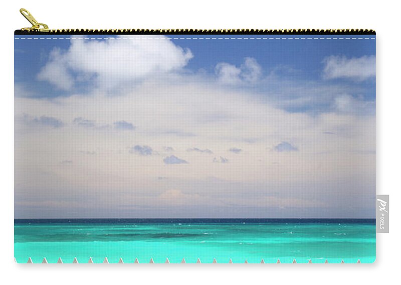 Tranquility Zip Pouch featuring the photograph View Of Caribbean Sea by Grant Faint