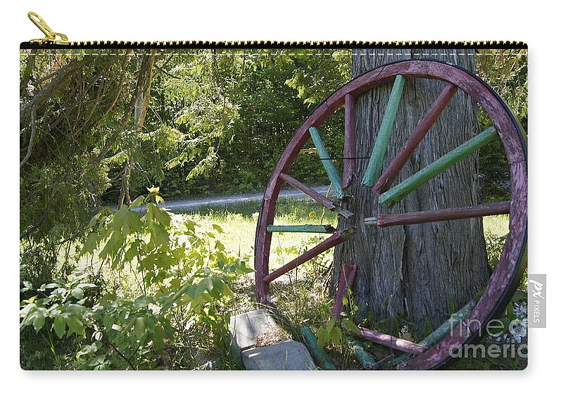 Canvas Print Zip Pouch featuring the photograph Wagon Wheel by Line Gagne