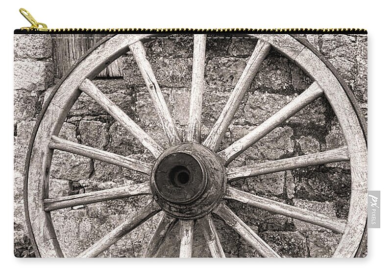Wagon Zip Pouch featuring the photograph Wagon Wheel by Olivier Le Queinec