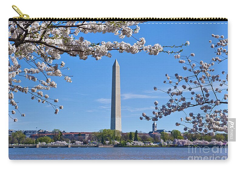 Washington Monument Zip Pouch featuring the photograph Washington Monument Spring Cherry Blossom trees Full Bloom Tidal Basin by David Zanzinger