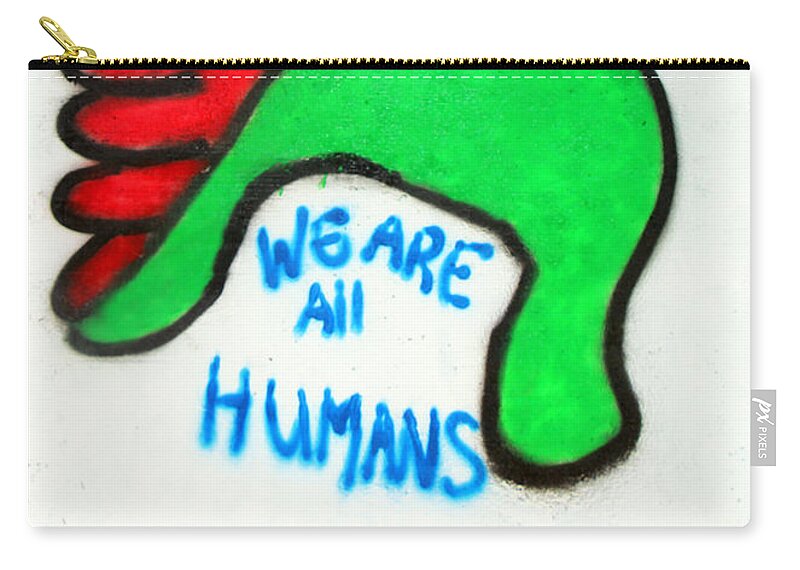 Holland Zip Pouch featuring the photograph We Are All Humans by Munir Alawi
