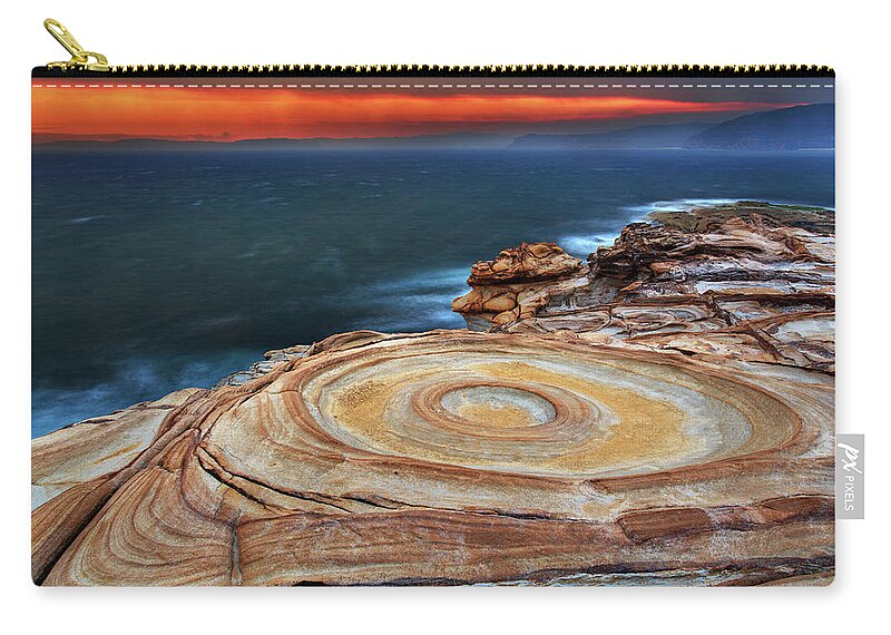Tranquility Zip Pouch featuring the photograph Weathered Rocky Shoreline At Sunset by Steve Daggar Photography