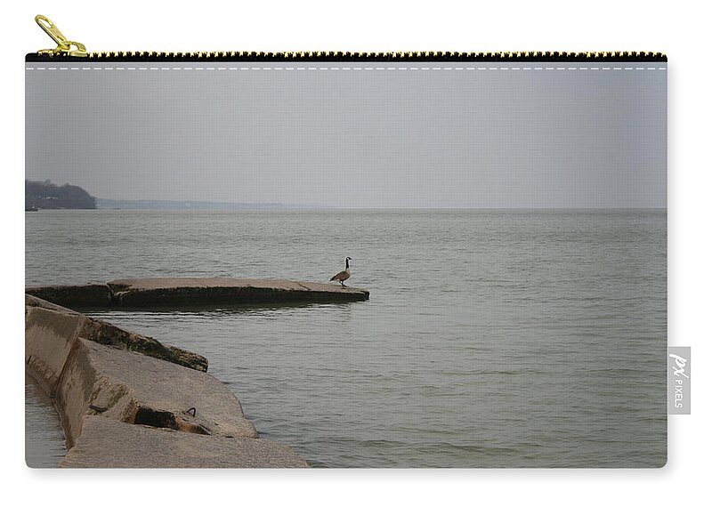 Canadian Geese Zip Pouch featuring the photograph Solitude on Lake Erie by Valerie Collins