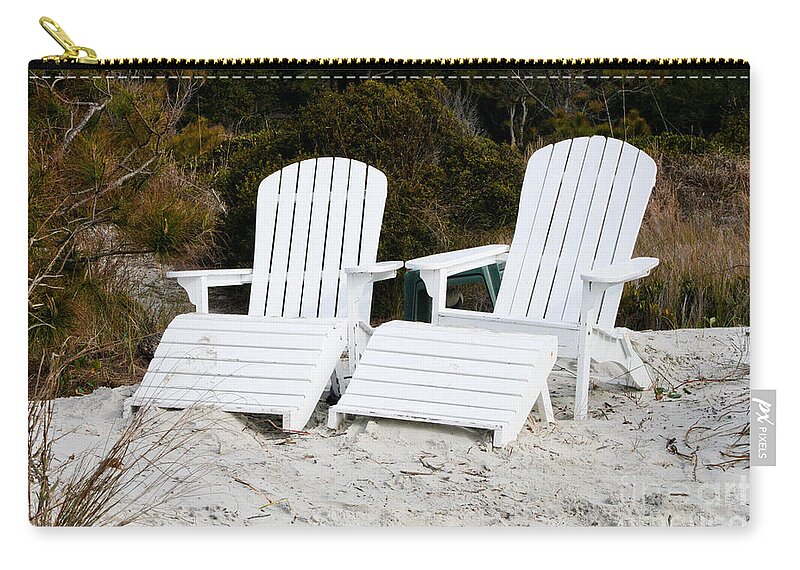 Adirondack Zip Pouch featuring the photograph White Adirondack Chairs in the Sand by Thomas Marchessault