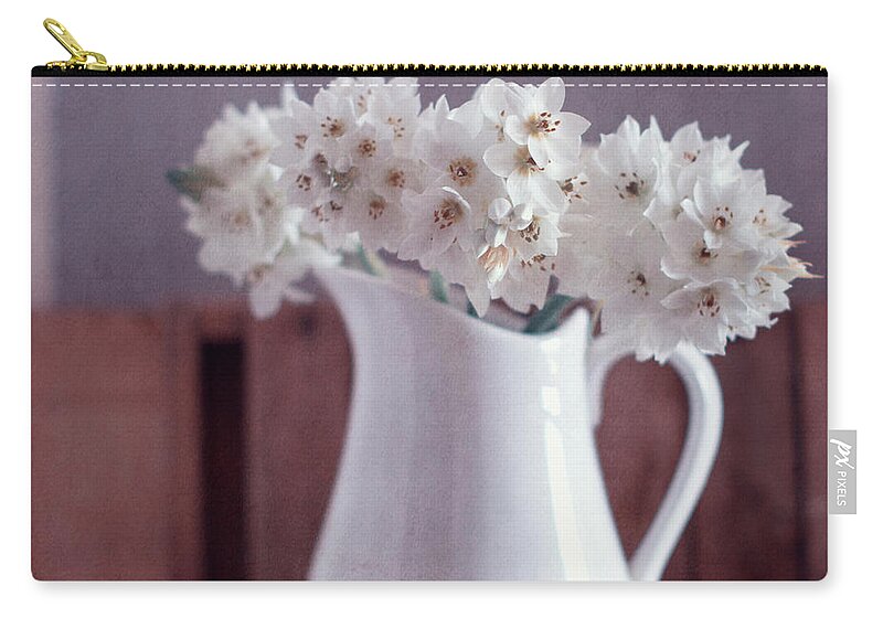 Fragility Zip Pouch featuring the photograph White Flowers In White Pitcher by Copyright Anna Nemoy(xaomena)