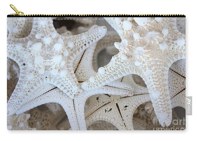 White Zip Pouch featuring the photograph White Starfish by Carol Groenen