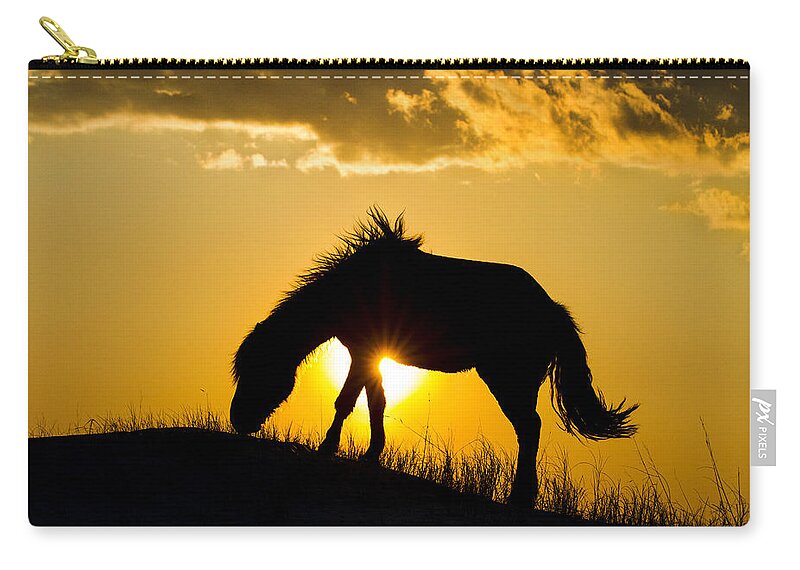 Horse Zip Pouch featuring the photograph Wild Horse and Setting Sun by Bob Decker