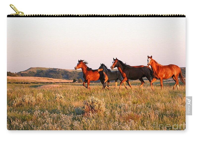 Animal Zip Pouch featuring the photograph Wild Horses at Sunset by Sabrina L Ryan