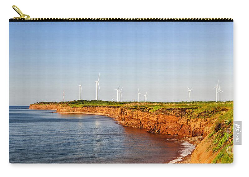 Windmills Carry-all Pouch featuring the photograph Wind turbines on atlantic coast 2 by Elena Elisseeva