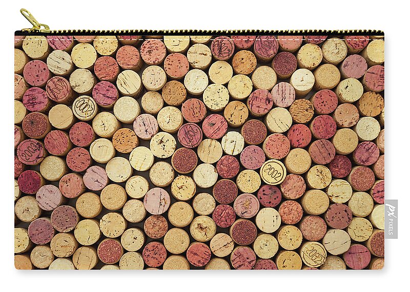 In A Row Zip Pouch featuring the photograph Wine Corks Background by Dem10
