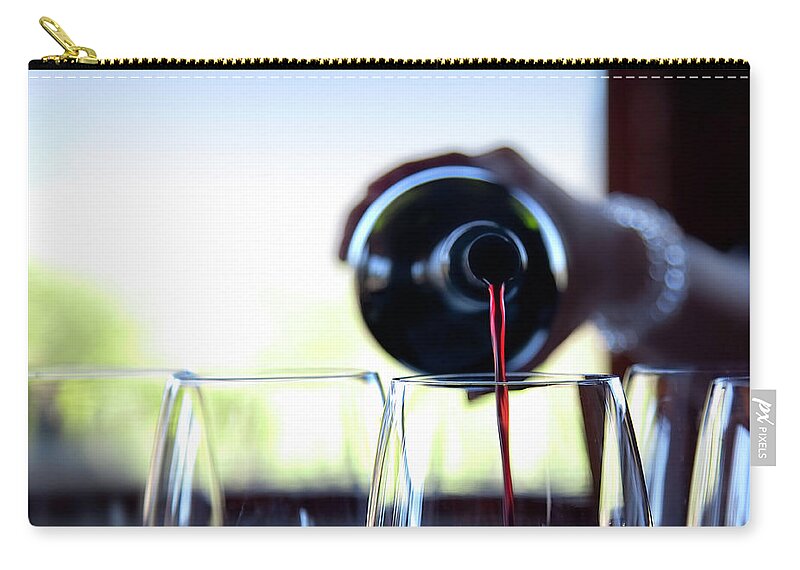 Recreational Pursuit Zip Pouch featuring the photograph Wine Pouring by Nicolamargaret