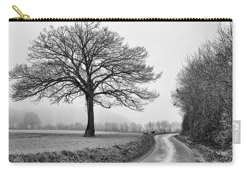 Tree Zip Pouch featuring the photograph Winter Tree by Jurgen Lorenzen