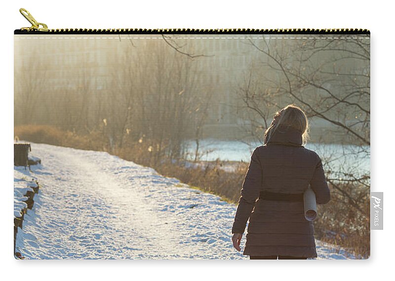 Mature Adult Zip Pouch featuring the photograph Woman Walking Along Path With by Ascent/pks Media Inc.