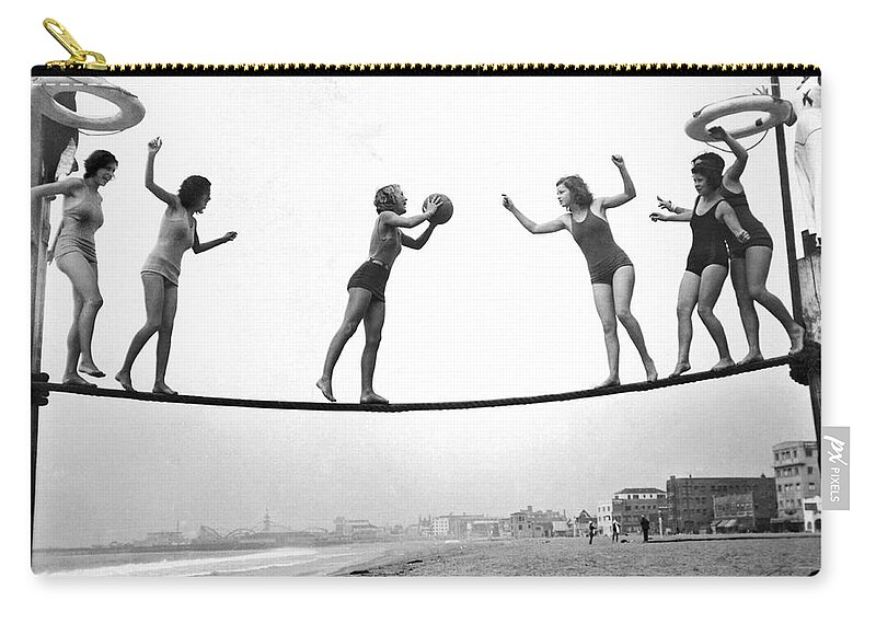1929 Zip Pouch featuring the photograph Women Play Beach Basketball by Underwood Archives