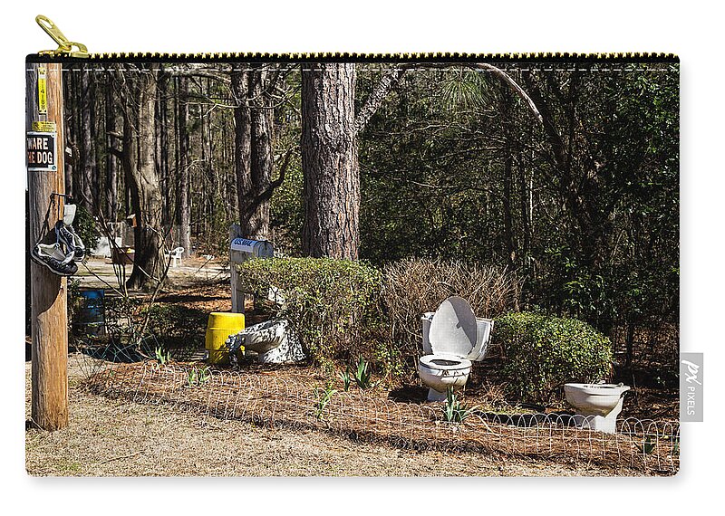 Calhoun County Zip Pouch featuring the photograph Yard Art Hwy 21 South by Charles Hite